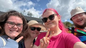 A selfie of SiCC & SLCC members Leah, Chloe, Kira and Ryan at Lyme Regis.
